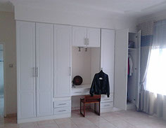 White Built in cupboards with dresser