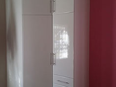 White high Gloss Built in cupboards 